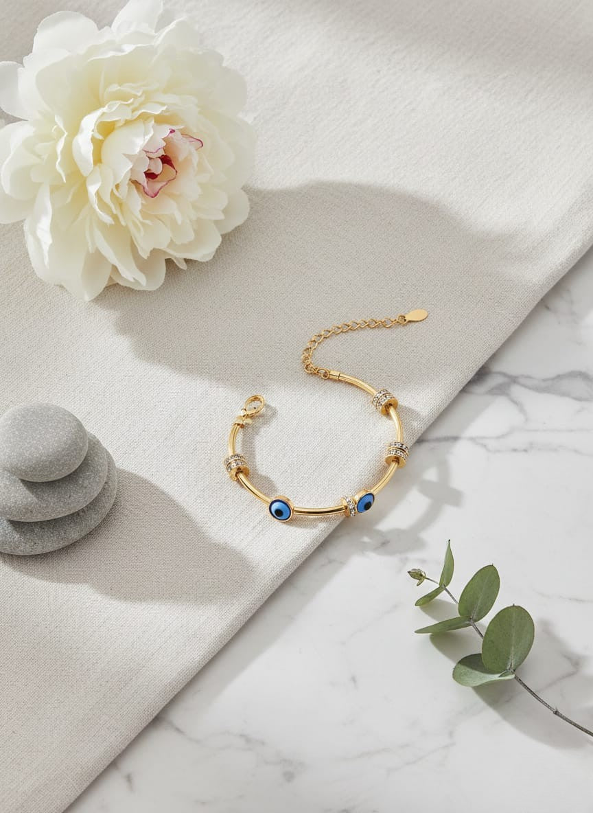 Golden Elegance: The Evil Eye Charm Bracelet