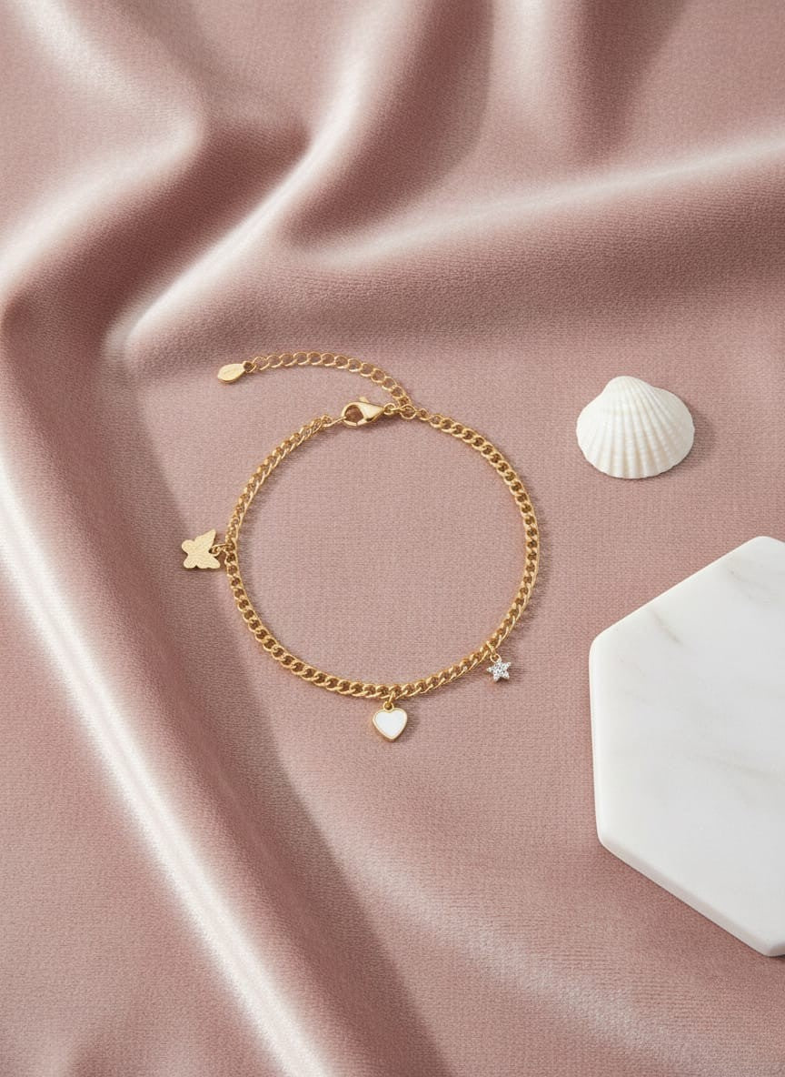 Elegant Gold Charm Bracelet with Butterfly Pendant