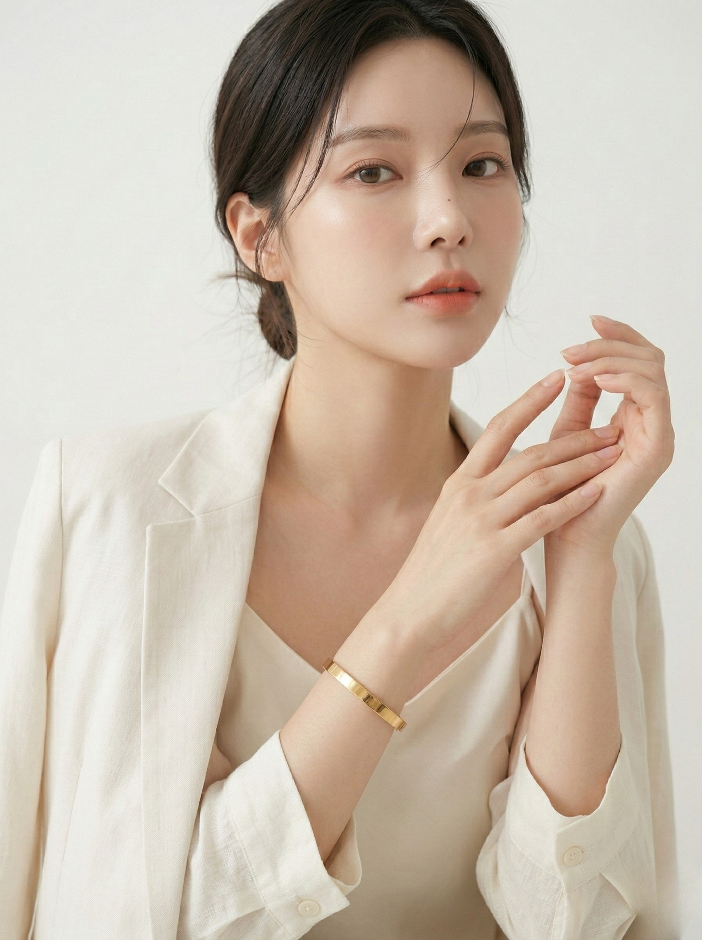 Elegant Gold Minimalist Bangle on Marble Surface