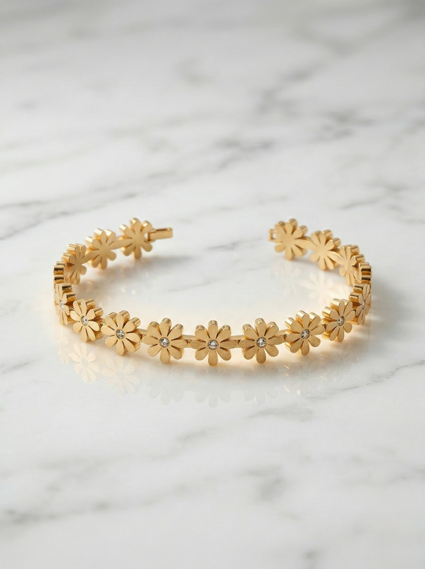Elegant Floral Gold Bracelet on Marble Surface