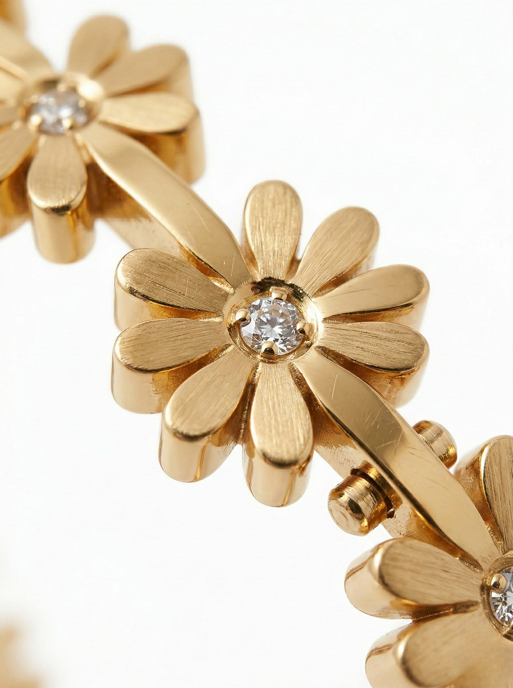 Elegant Floral Gold Bracelet on Marble Surface